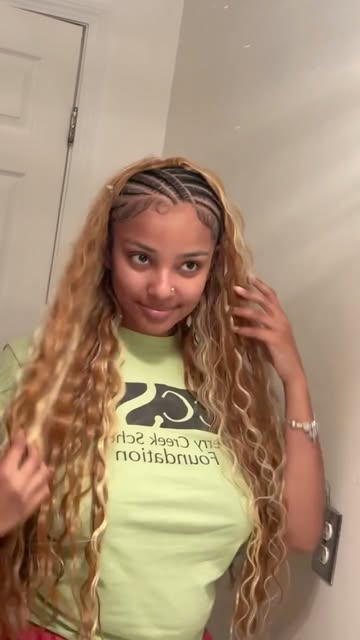 Long blonde braids with loose curls