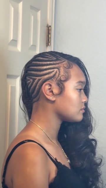 Aleia’s intricate curved stitch braids with flowing curls